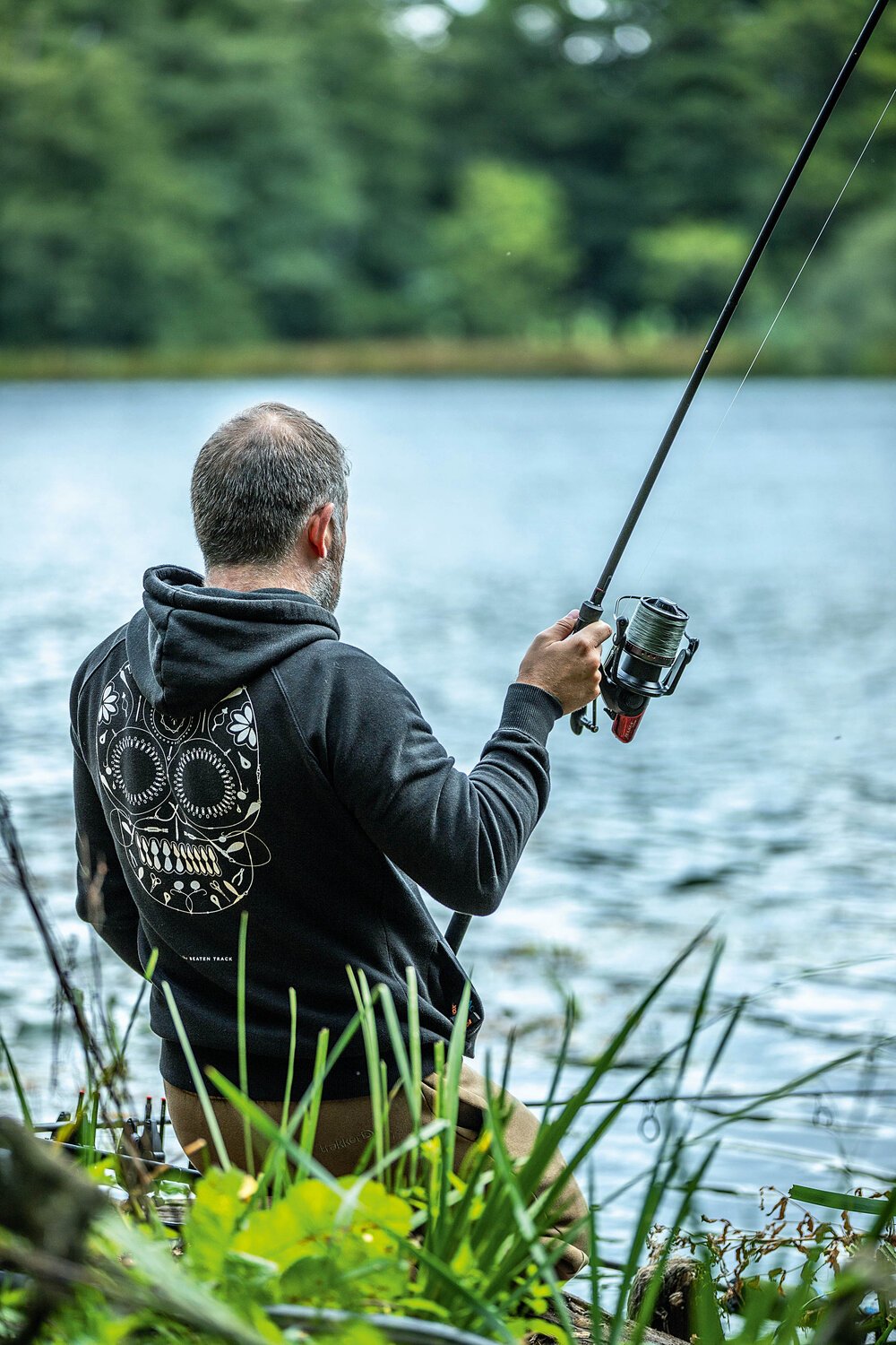 Guiding another fish towards the waiting net